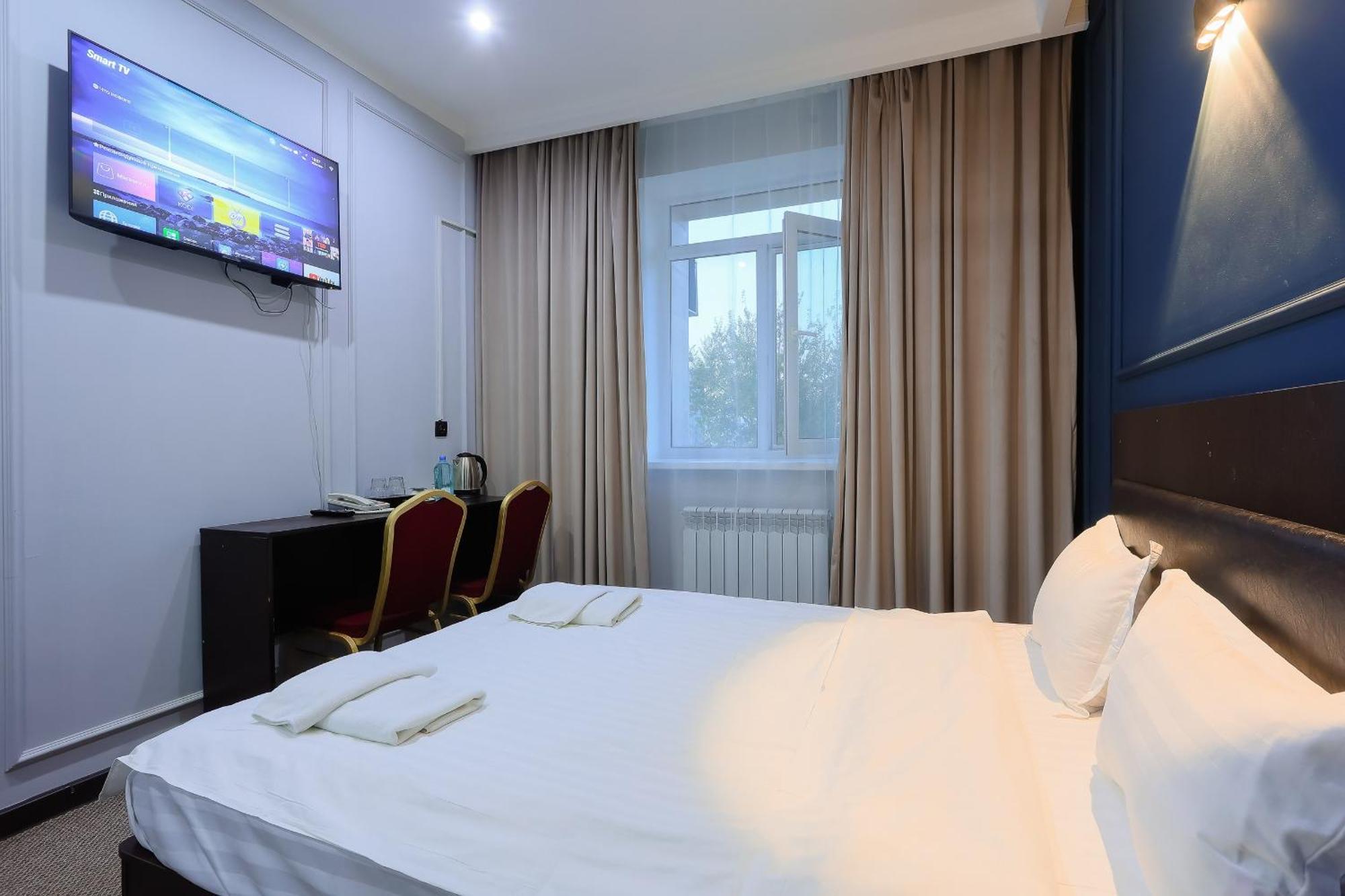 Hotel Vivaldis Alma-Ata Buitenkant foto